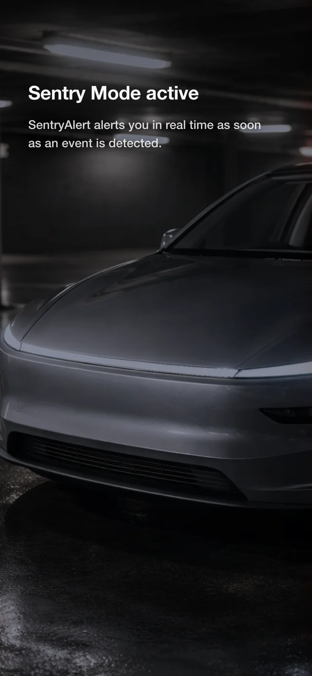 Tesla with Sentry Mode active in a dark parking garage
