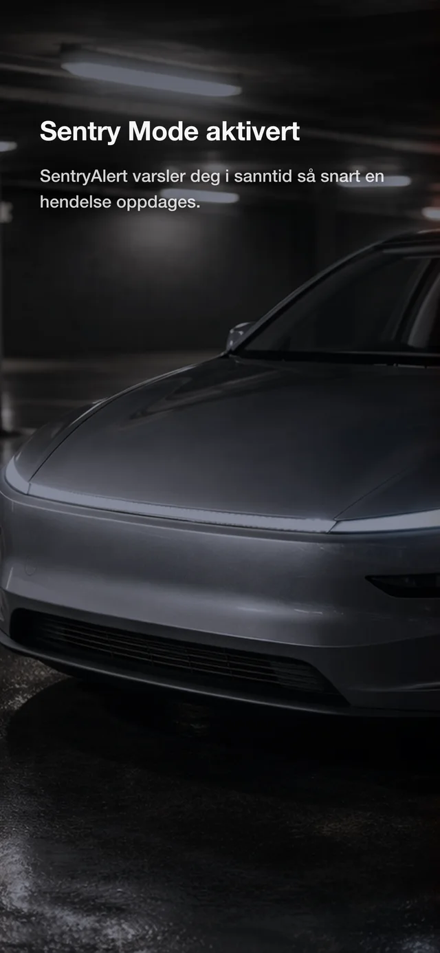 Tesla med Sentry Mode aktivert i et mørkt parkeringshus